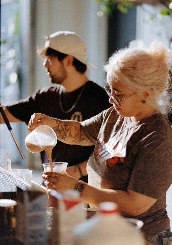 Barista pouring an iced drink